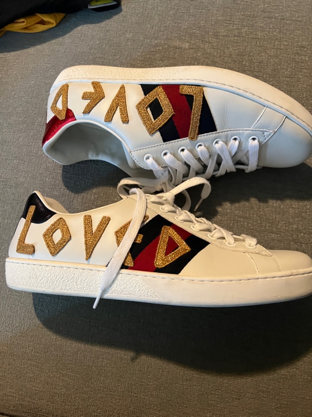 Gucci White Leather Sneakers with Gold 'LOVE' Embroidery and Red & Blue Stripes